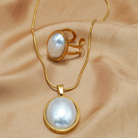 Lxalry Golden Jewelry Set - Elegant Necklace & Ring Combo With Oval Design, Metal Polished Finish, Perfect For Both Day & Night Occasions