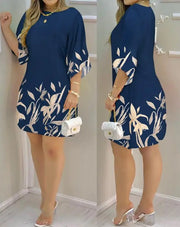 Vestido feminino de fibra sintética com estampa floral, manga ampla e modelagem reta.